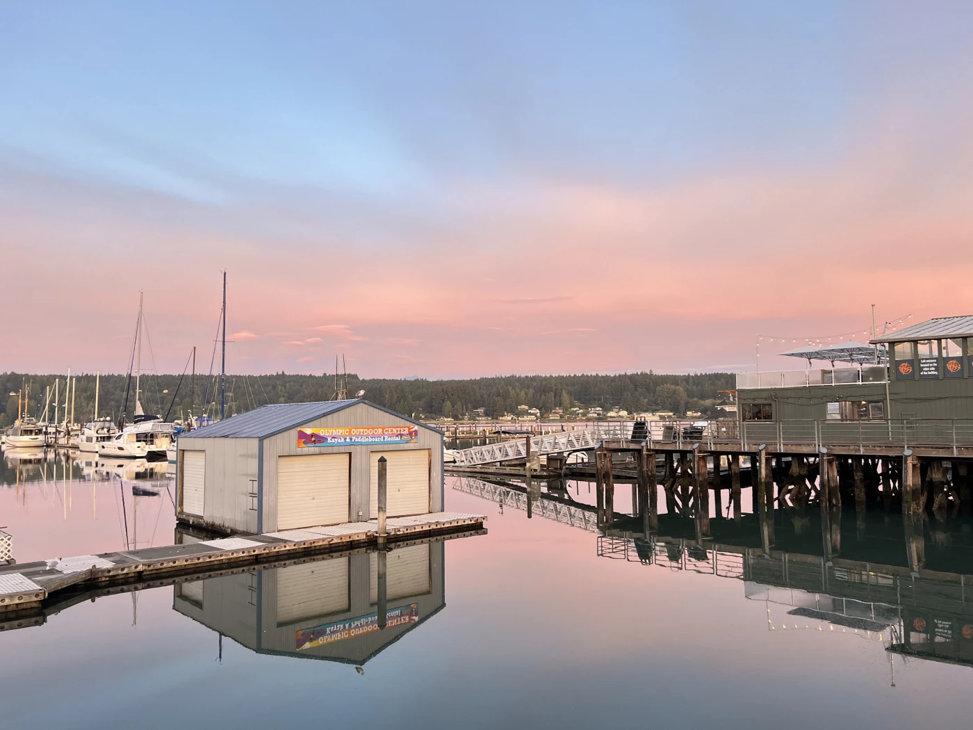 The boat house contrast with the soft pink sunrise ~ draws my eye 
“Pink sunrise boathouse”-2024