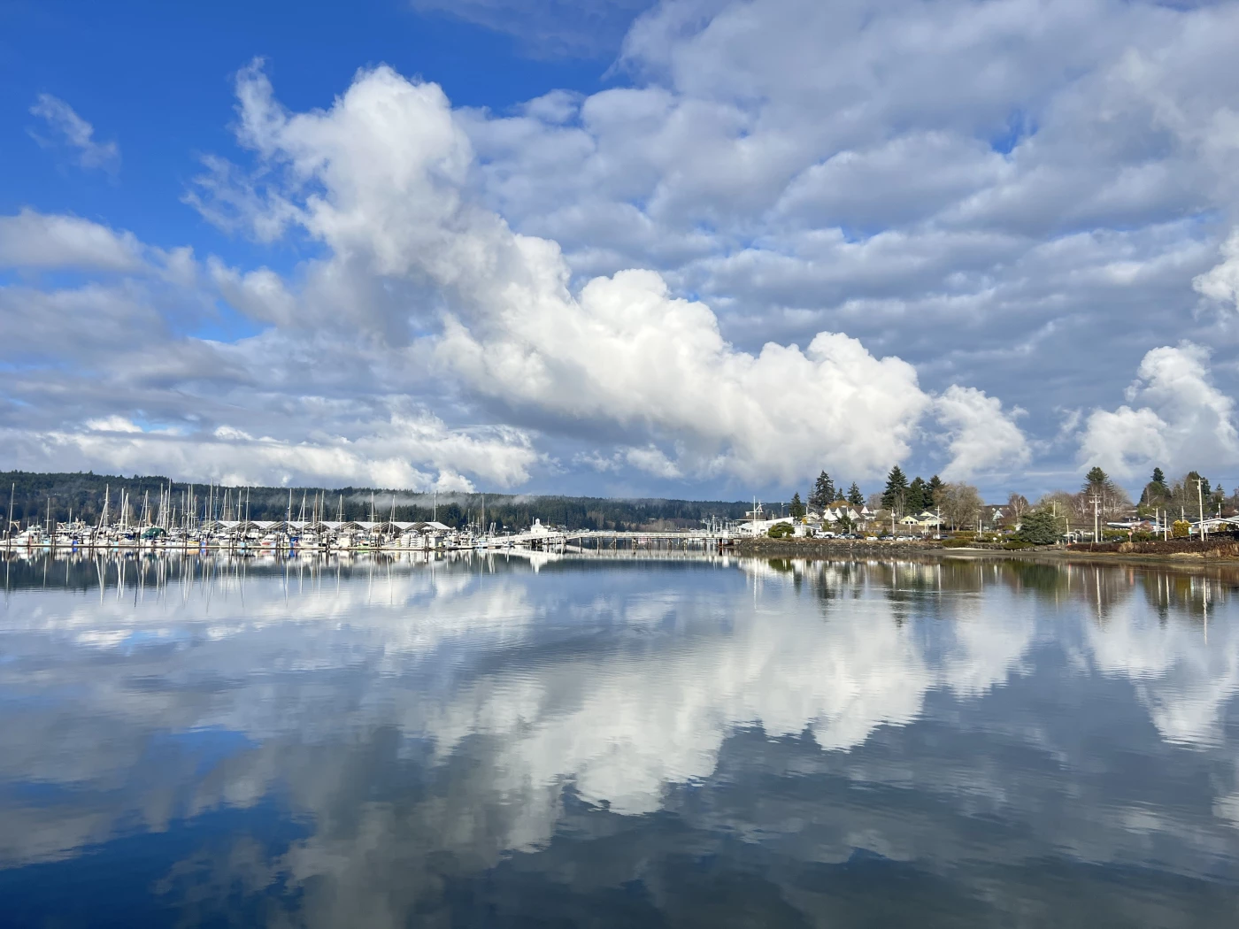 Dramatic clouds framing the Poulsbo's Yacht club Marina 
'Drama'-2025