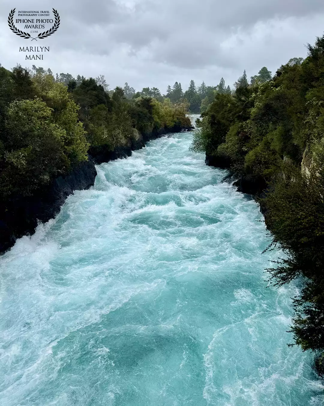 Huka Falls, New Zealand. That beautiful blue water, the insane rush of the waterfalls and the beautiful scenery around is serene yet exciting at the same time!